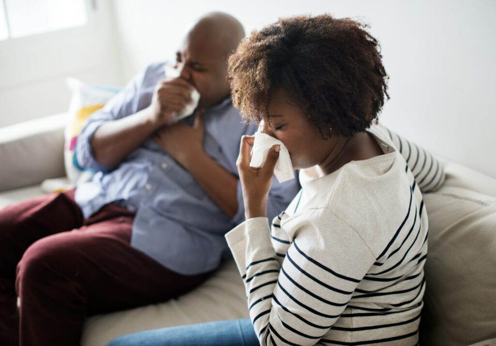 people sneezing at home